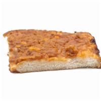 Upside Down Sicilian Pie Pizza · Flipped upside down pie topped on a bed of mozzarella cheese.