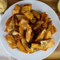 Pita Chips · Housemade pita wedge chips.