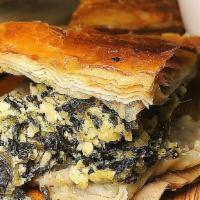 Spanakopita · Traditional Greek “spinach pie” made in house with Yia Yia’s recipe.