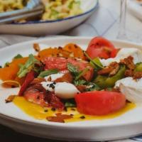 Burrata Salad · heirloom tomato, arugula, almonds, ginger mango dressing