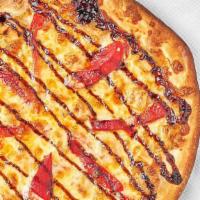 Truffle Chicken Balsamico Pizza · Grilled chicken, roasted peppers, mozzarella and truffle balsamic glaze.