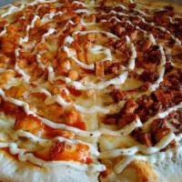 Buffalo Chicken Pizza · Breaded buffalo chicken, topped with mozzarella, and drizzled with swirls of our buffalo sau...