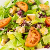 The Beautiful Garden Salad · Lettuce, tomatoes, onions, cucumber, carrots, and olives. Served with homemade Italian vinai...