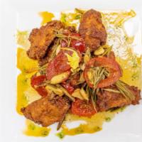 Buffalo Wings Scarpariello · Our famous wings cooked up crispy tossed in garlic sauce with fresh rosemary spices and cher...