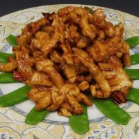 Heavenly Chicken 渝州凤花 · Chicken tender in the shape of blossom sautéed snow peas and ginger spicy sauce.