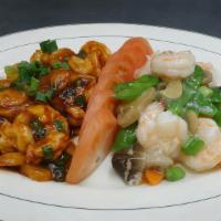 Shrimp Duet 鸳鸯虾 · Hot and spicy. Stir fried shrimp with vegetable on one side and jumbo shrimp in garlic sauce...
