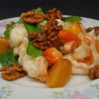 Prawn With Walnut Meat 核桃大虾 · Prawn sauteed with peaches & sweet walnut meat.