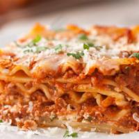 Lasagna · Stacked layers of pasta packed with meat and cheese, covered in red sauce pro tip: go for th...