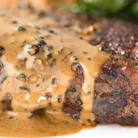 Pan Roasted Filet Mignon Peppercorn · 10oz filet mignon pan-seared, topped with east coast crust peppercorn sauce.