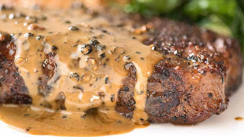 Pan Roasted Filet Mignon Peppercorn · 10oz filet mignon pan-seared, topped with east coast crust peppercorn sauce.