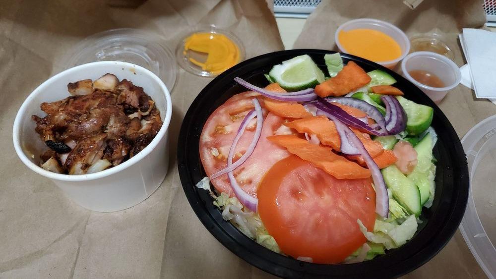 Fresh Garden Salad With Grilled Chicken · Served with fresh garden lettuce, tomato, cucumber and carrot with French dressing.