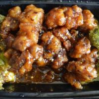 General Tso'S Chicken · Breaded and deep fried chicken with sweet and spicy sauce bedded with fres broccoli. Served ...