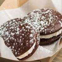 Whoopie Pies · Rich, dark chocolate cakes with a delicious whipped marshmallow filling sandwiched between t...