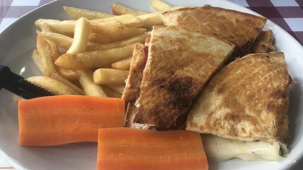 Grilled Chicken Panini · Sliced chicken breast, mozzarella cheese, basil, and roasted red peppers, sprinkled with balsamic vinaigrette dressing.