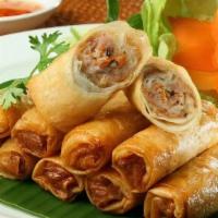 Vietnamese Spring Roll · Crispy pork spring rolls served with vinaigrette and lettuce.