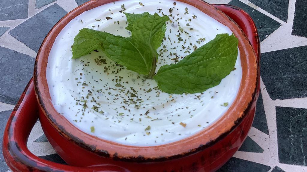 Labneh Platter · Lebanese yogurt cheese drizzled with olive oil and served with garden vegetables.