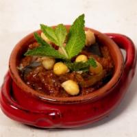 Msakaa · A delicious vegan eggplant, onion and chickpea stew cooked in tomato sauce and flavored with...