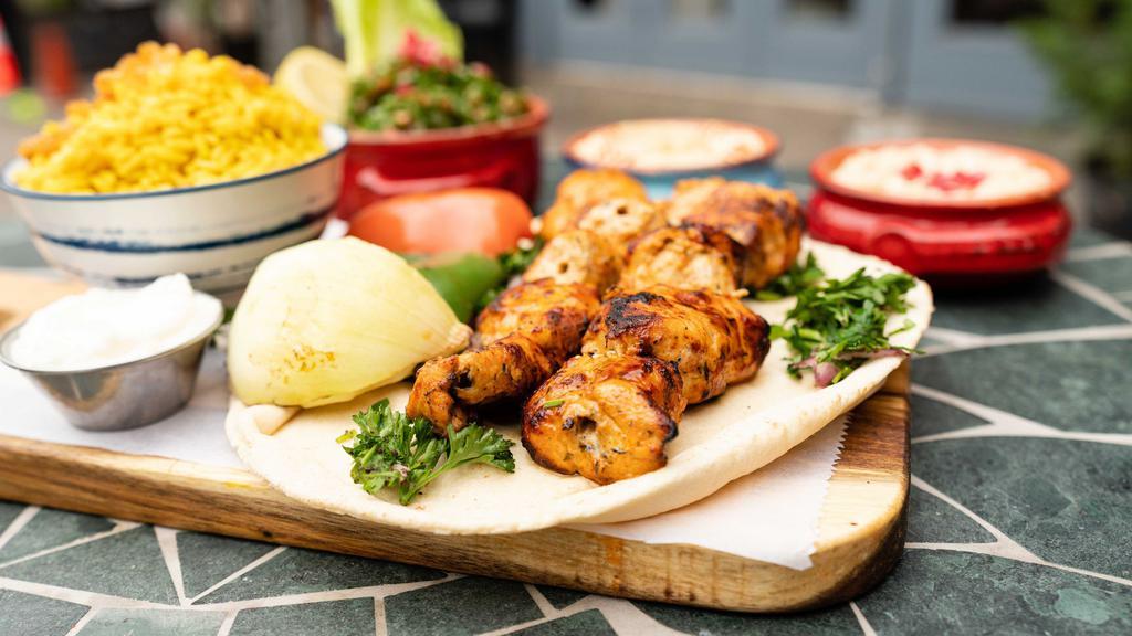 Shish Tawouk · Skinless boneless chicken breast cubes marinated in a special blend of spices.