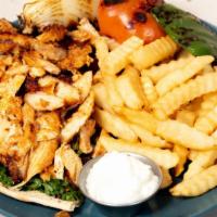 Chicken / Lamb Shawarma · Thinly sliced cuts of your choice of chicken or lamb.