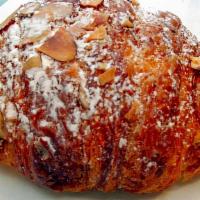 Almond Croissant · With toasted almonds and our house made frangipane.