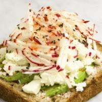 Avocado And Feta Tartine · With radish, feta cheese, black sesame seeds, and togarashi seasoning on our multigrain bread.