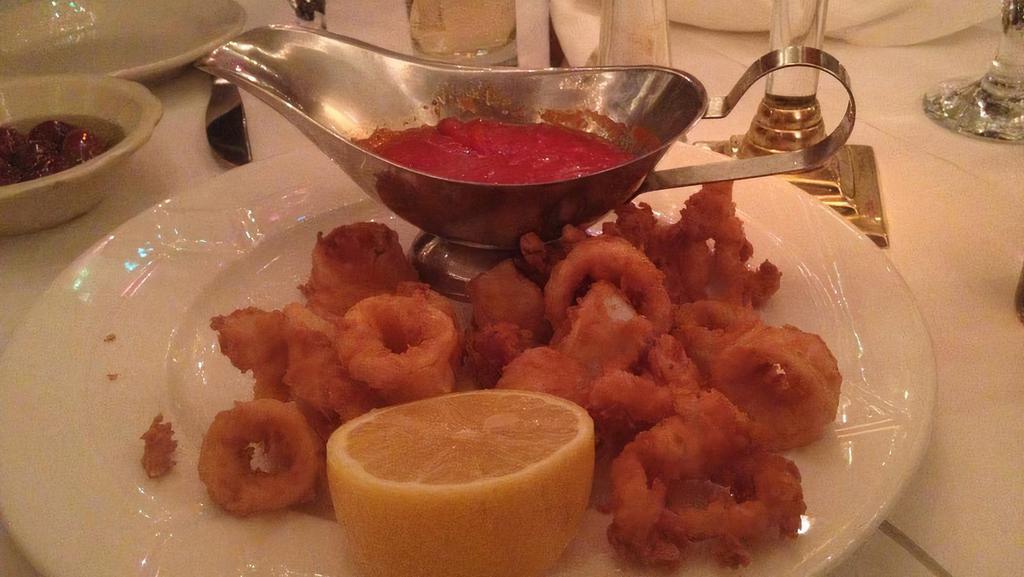 Calamari Fritti · Lightly battered and fried, served with a spicy tomato sauce (restivo classic).