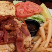 Crispy Chicken Sandwich · Juicy fried chicken cutlet prepared in our flour batter topped with bacon, pepper jack chees...