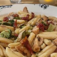Cavatelli, Broc & Chic · Cavatelli pasta, broccoli, sun-dried tomatoes, pan seared chicken, white wine sauce.