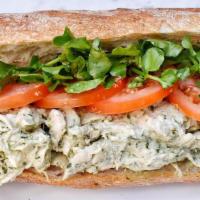 Basil Parmigiano Chicken Salad Sandwich · roasted chicken, pesto dressing, tomatoes, watercress, on baguette