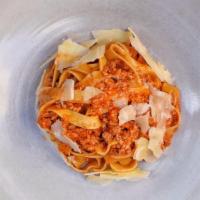 Fettuccine Bolognese · with veal Bolognese sauce