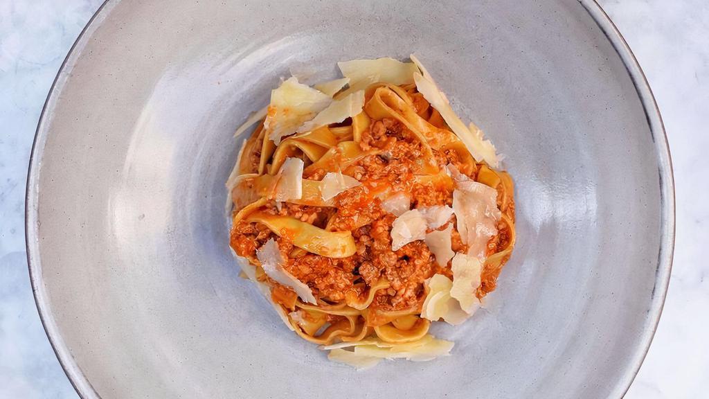 Fettuccine Bolognese · with veal Bolognese sauce