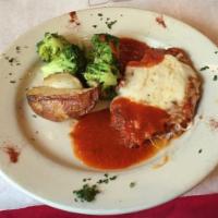 Chicken Parmigiana · tomato sauce and mozzarella, served with roasted potato and broccoli