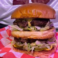 Big Mick · Two Quarter Pound Burgers, Lettuce, American Cheese, Pickles, Minced Onions, and McDowell’s ...
