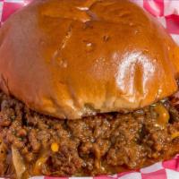 Sloppy Joe · Ground beef, caramelized onions, sloppy sauce, Cheddar cheese, brioche bun.