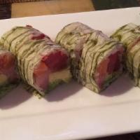 Fantasy Roll · Salmon, tuna, yellowtail, avocado and tobiko with marble seaweed and special sauce.