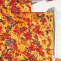 Grandma Pizza (12 Slices) · Thin crust pan pizza layered with mozzarella and grated pecorino Romano cheeses, then spotte...
