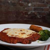 Pollo Alla Parmigiana · Breaded chicken cutlet with mozzarella and tomato sauce. Served with a potato croquette and ...