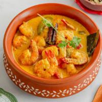 Shrimp Tawa Masala · Fillet of fresh fish with ginger, garlic, mustard seed, curry leaf and coconut milk.