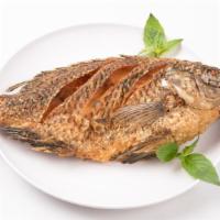 Fried Fillet Of Tilapia · Fillet of fresh fish with ginger, garlic, mustard seed, curry leaf and coconut milk.