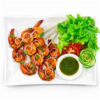 Tandoori Shrimp · Shrimp Marinated in Authentic Spiced Yogurt & Herbs in Charcoal Oven.