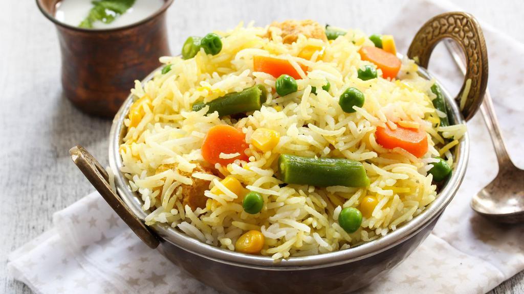 Vegetable Biryani · Basmati rice with fresh vegetables, homemade spices and dry fruits.