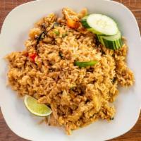 Basil Fried Rice · Fried rice with thai chili peppers, bell peppers, onions and thai basil.