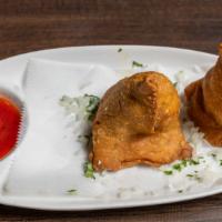 Vegetable Samosa · Vegetarian. Crispy pastry filled with boiled potatoes, green peas & spices.
