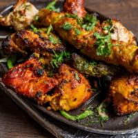 Zaika'S Chicken Mix Grill · Assorted chicken BBQ pieces-achari boti, malai boti, tikka boti, seekh kebab, chicken Bihari...