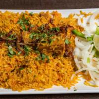 Chicken Biryani · Rice cooked with small chicken pieces with bones & strong aromatic spices.