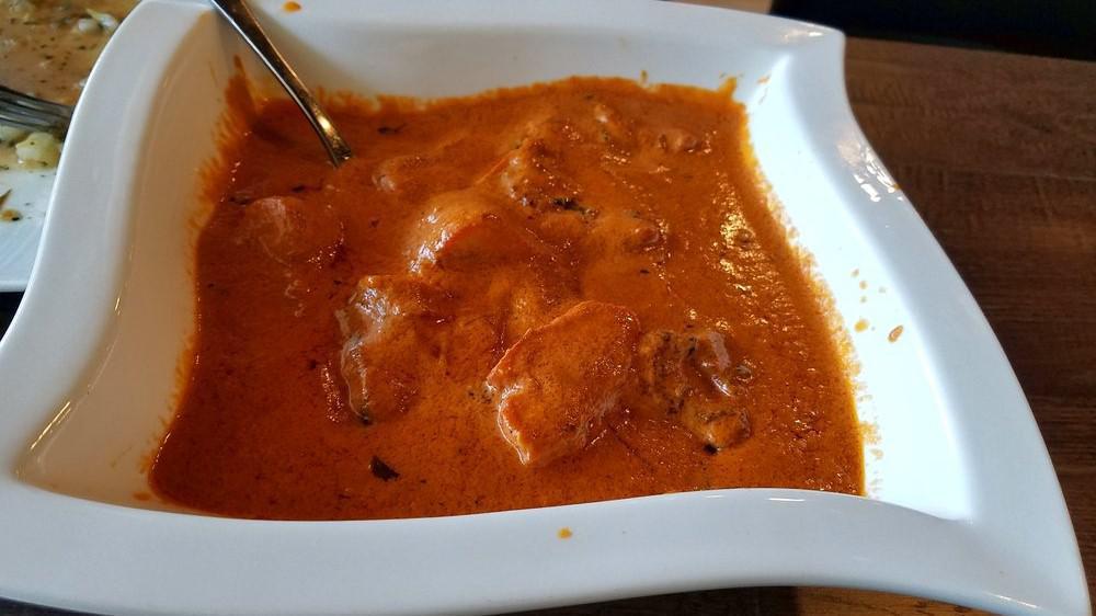 Butter Chicken · Grilled chicken breast cooked in a creamy butter sauce & spices.
