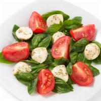 Fresh Mozzarella & Tomato Salad · Creamy Mozzarella & Juicy Tomato Salad.