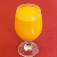 Mango Lassi · Refreshing Mango and yogurt drink.