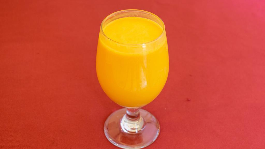 Mango Lassi · Refreshing Mango and yogurt drink.