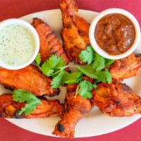 Tandoori Chicken Wings · Six pieces. Bone-in chicken, grilled to perfection.